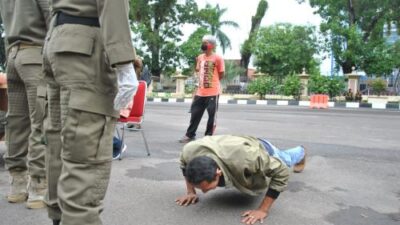 Tak Pakai Masker di Jambi? Bakal Kena Hukum Push-up dan Nyanyi