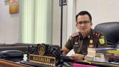 Terdakwa Sarbaini Menjalani Sidang Perdana Jembatan Besi dari Lapas