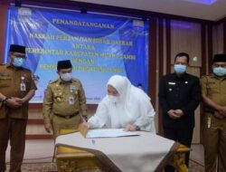 Bupati Masnah Tandatangani Naskah NPHD Bersama Pemprov Jambi