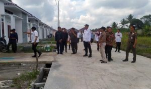 Pj Bupati Muarojambi Menghadiri Serah Terima Secara Simbolis Prasarana, Sarana, dan Utilitas (PSU)