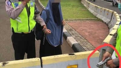 Siti Elina, Wanita Bercadar diamankan polisi.